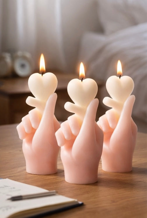Hand heart candle